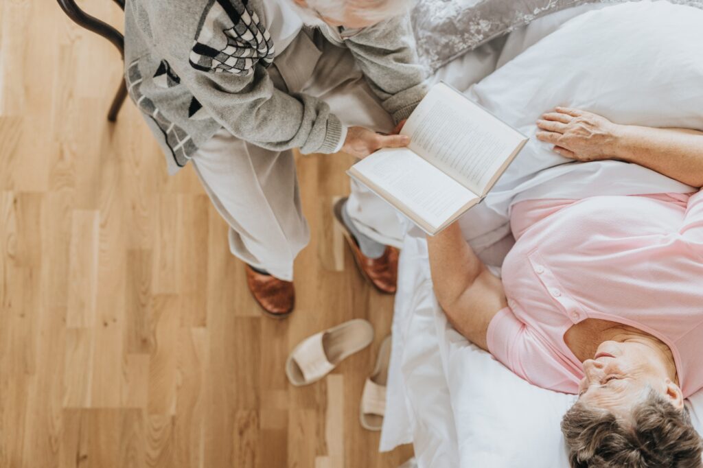Reading a book to wife